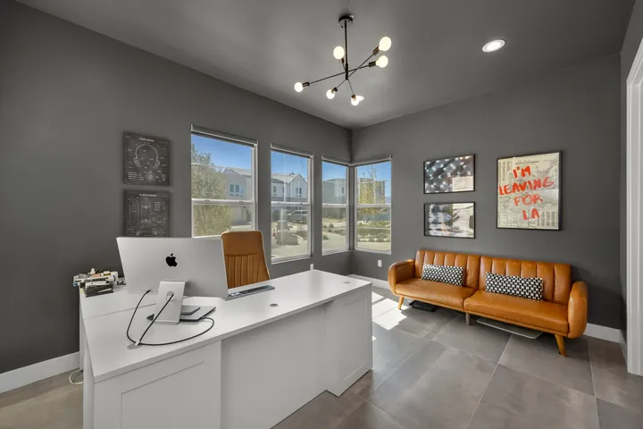 Home office with charcoal walls, a white desk and large windows, interior design in Santa Clarita, CA, photo 12